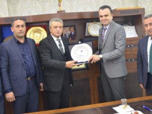 HATSO’dan DAKA Genel Sekreteri Güray'a plaket