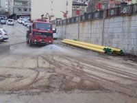 Yağmur sonrası cadde temizliği
