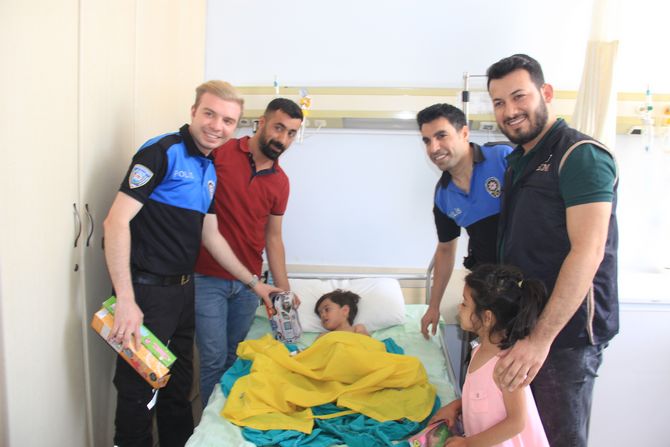 tdp-polis-cocuklari-sevindirdi-m1.jpg